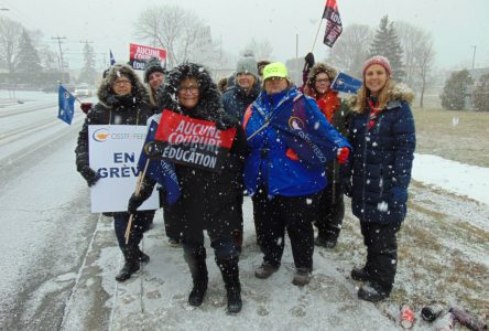 Teachers and support staff walk out