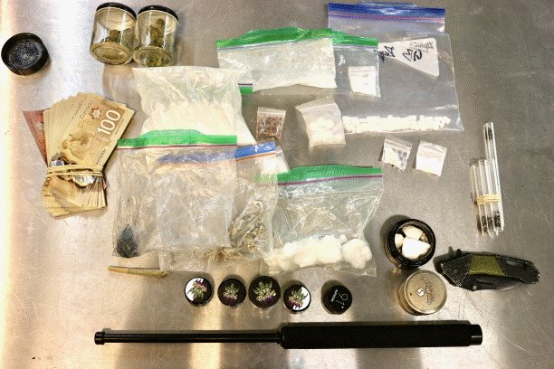 Suspected drugs, cash seized from vehicle