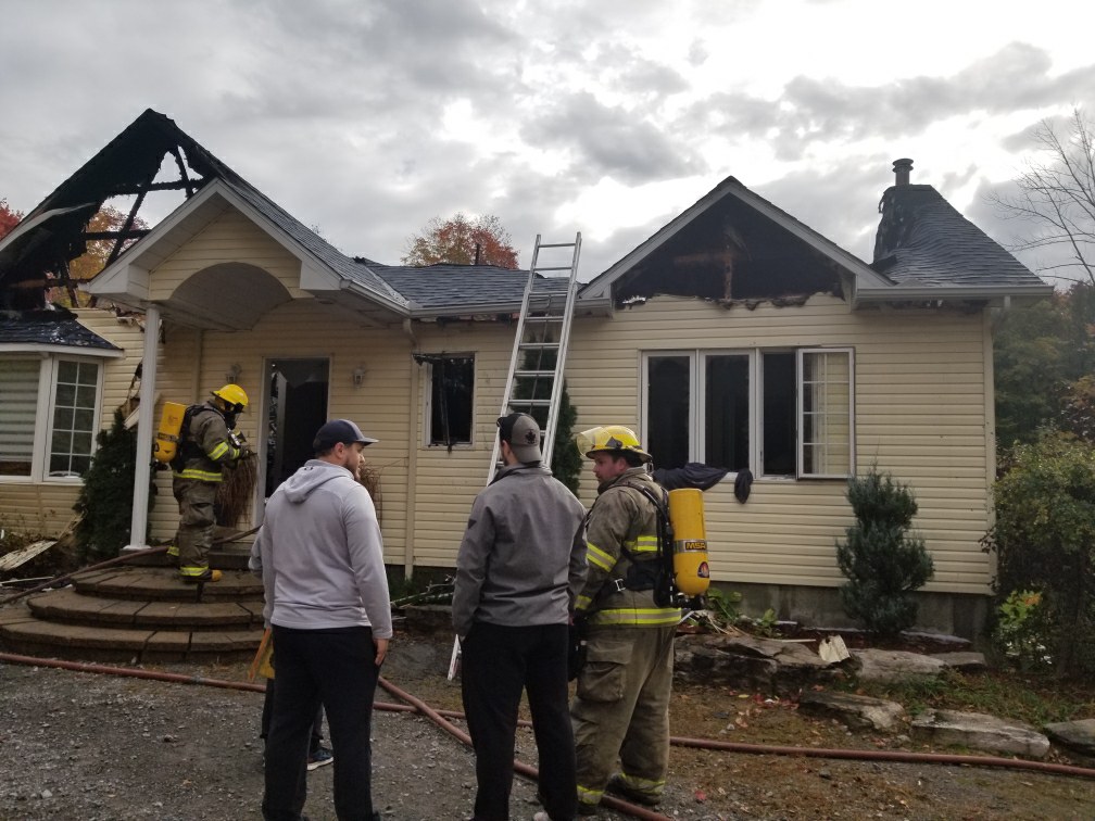 RV fire destroys house too