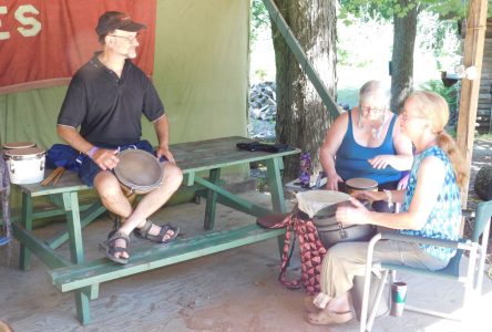 Gathering by the fire for a music festival