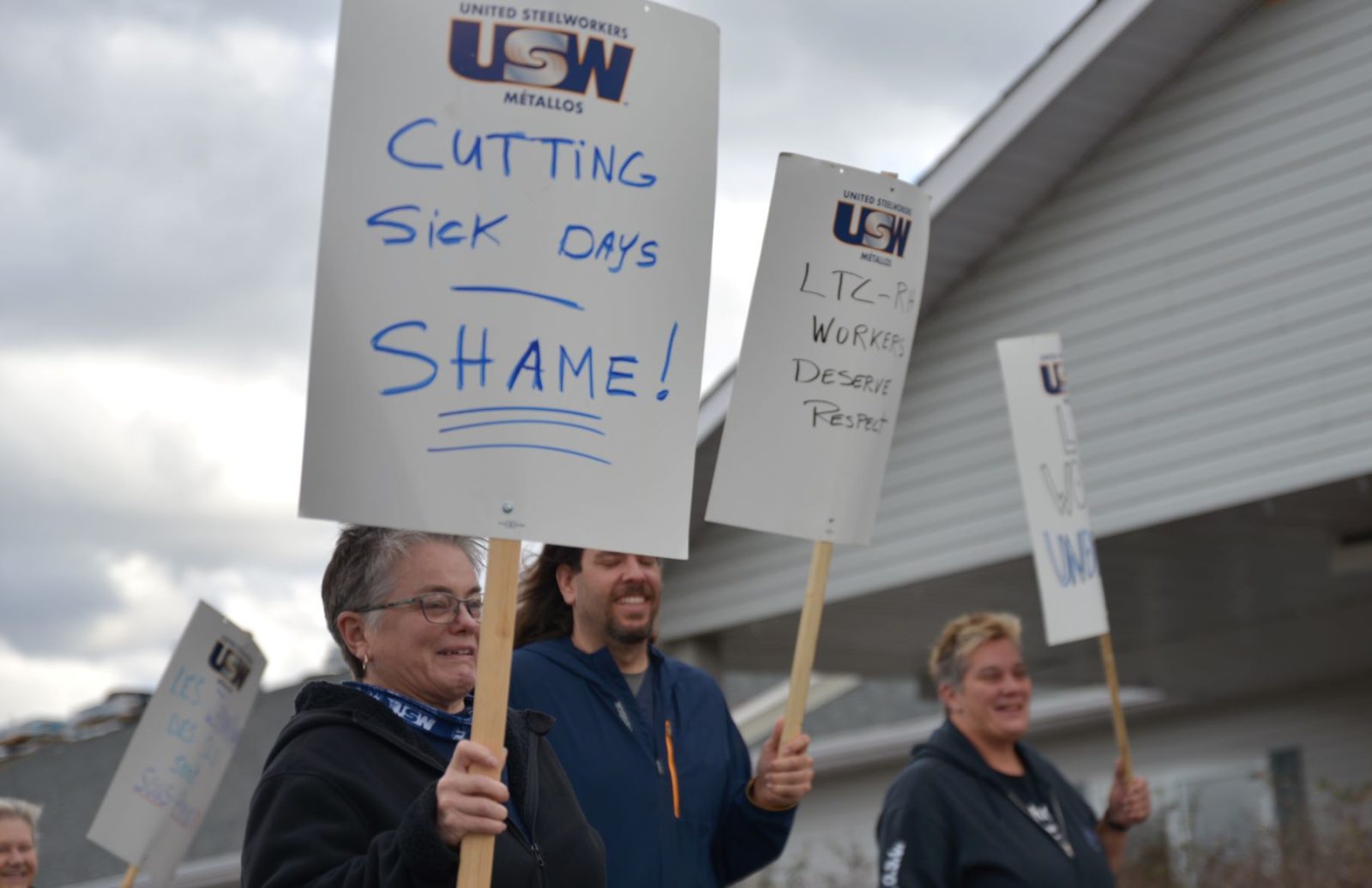 Pinecrest workers picket for sick days